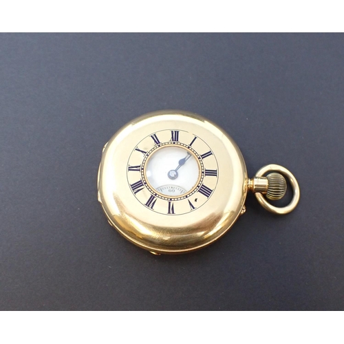 69 - A late Victorian 18ct gold cased half hunter Pocket Watch the white enamel dial with roman numerals ... 