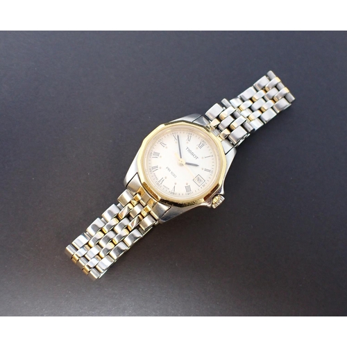 74 - A lady's Tissot PR100 Wristwatch the cream dial with roman numerals, sweep seconds hand and date ape... 