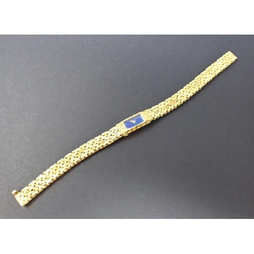 75 - A Boucheron Cocktail Watch, the rectangular blue enamel dial with gold hands, rear wind on integral ... 