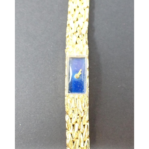 75 - A Boucheron Cocktail Watch, the rectangular blue enamel dial with gold hands, rear wind on integral ... 