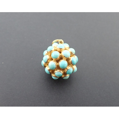 83 - A Turquoise Pendant of spherical form set numerous round cabochons