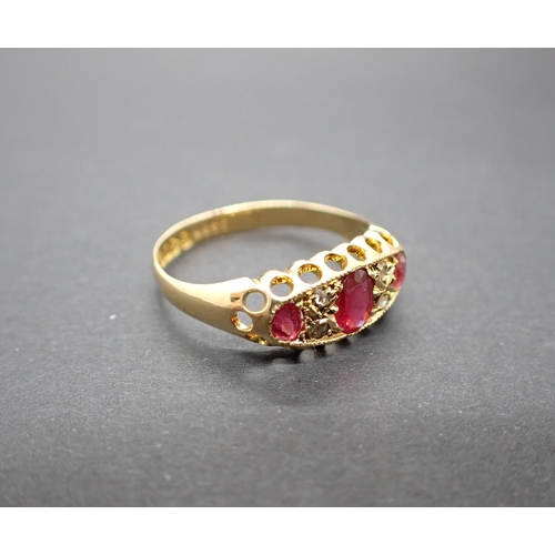 86 - An early 20th Century Ruby and Diamond Ring pavé-set three graduated oval-cut rubies with pairs of r... 