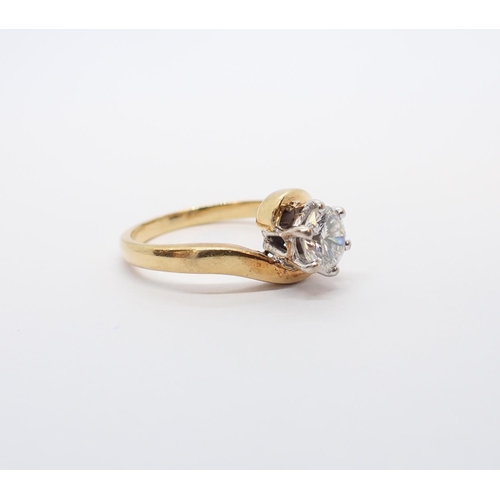 88 - A Diamond single stone Ring claw-set brilliant-cut stone, estimated 0.75cts, in 18ct gold crossover ... 