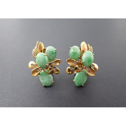 89 - A pair of Jade Flower Spray Ear Clips each claw-set three oval cabochons, stamped 14K, approx 10gms