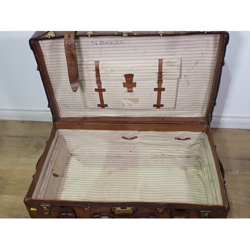 459 - A large heavy leather Travelling Trunk with brass fittings, 3ft W and a leather Suitcase with brass ... 