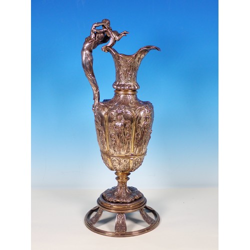 39 - A 19th Century Elkington & Co relief cast silver plated Charger, 1ft 9in Diam, and matching Ewer on ... 