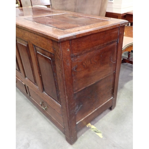 388 - An 18th Century oak Mule Chest with plain 2-panel lid above four plain fielded panel front above two... 