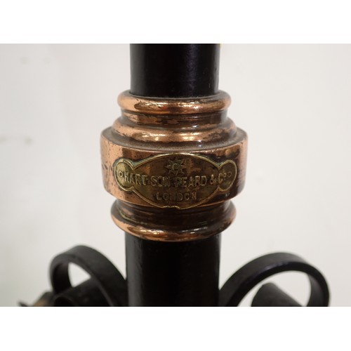 33 - A wrought iron Lamp Standard with opaque shade and copper reservoir, 5ft 5in H (passed PAT)