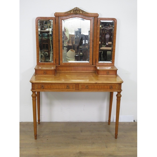 46 - An Edwardian satinwood Dressing Table with gilt metal crest, triptych mirror, fitted two small and t... 