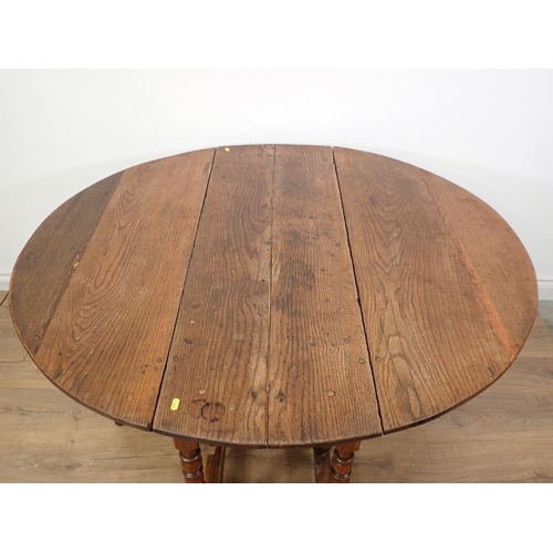 120 - An antique oak Gateleg Table in the 17th Century style mounted upon bobbin turned supports 4ft x 2ft... 