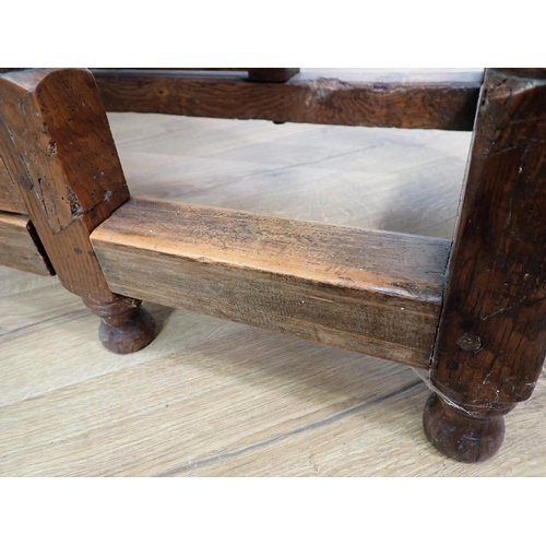 120 - An antique oak Gateleg Table in the 17th Century style mounted upon bobbin turned supports 4ft x 2ft... 