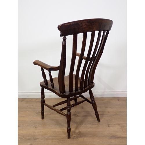 132 - An antique ash and elm lath back Kitchen Armchair 3ft 8in x 1ft 11in