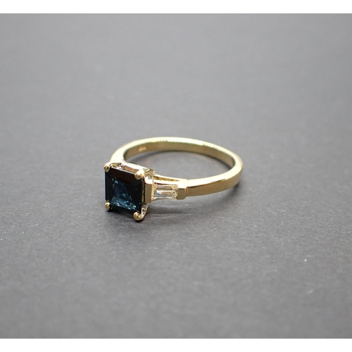 179 - A Sapphire and Diamond three stone Ring corner claw-set step-cut square sapphire, 1.10cts, between t... 