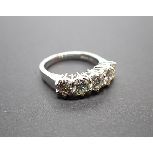 183 - A Diamond five stone Ring claw-set brilliant-cut stones, total diamond weight 1.10cts, in 18ct white... 