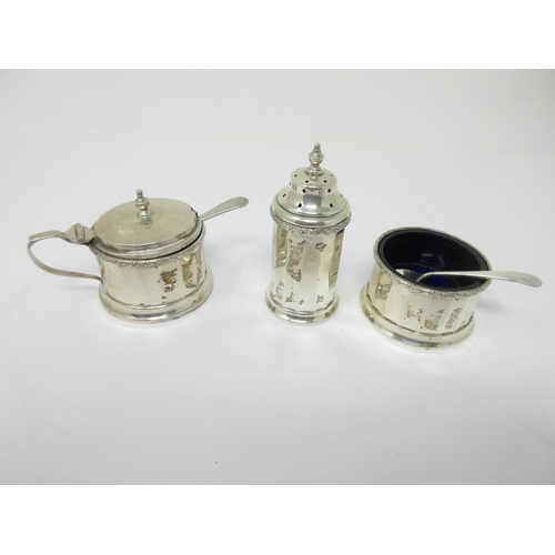 203 - A George V silver three piece circular Condiment Set, Birmingham 1932/4