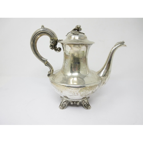 213 - A Victorian silver Teapot and Coffee Pot of compressed circular form having oak leaf and acorn finia... 