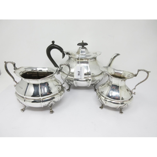 216 - A George V silver three piece Tea Service of panelled oval form on shaped feet, Sheffield 1912, 1050... 