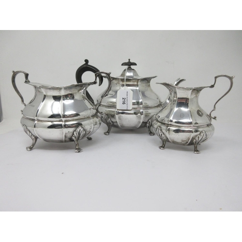 216 - A George V silver three piece Tea Service of panelled oval form on shaped feet, Sheffield 1912, 1050... 