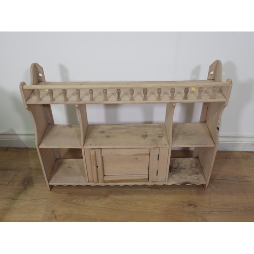 253 - An oak Side Table fitted single frieze drawer and a set of pine Wall Shelves with central cupboard d... 