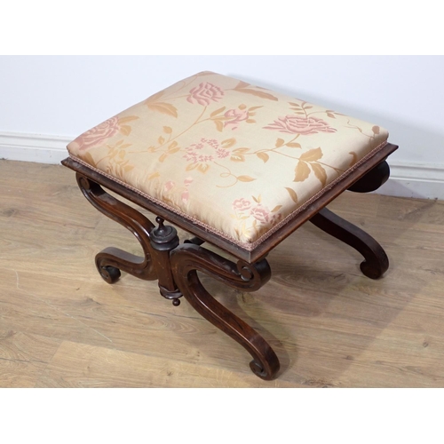 254 - A Victorian rosewood Footstool on scrolled x-framed supports and silk floral decorated seat 1ft 10in... 