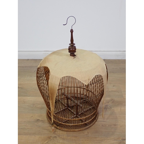 257 - An Oriental wooden decorative Bird Cage 2ft 1in