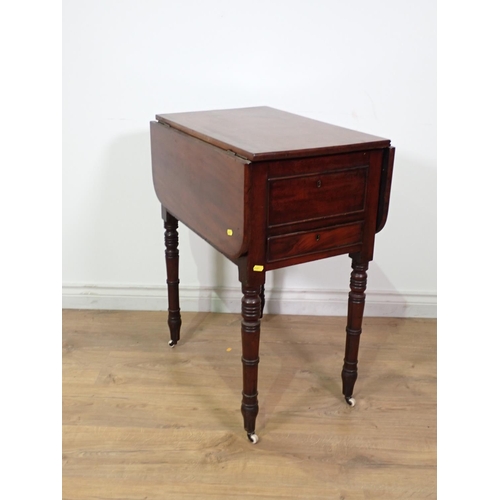 258 - A Victorian mahogany drop leaf Wash Stand fitted pair of cupboard doors mounted upon ring turned sup... 