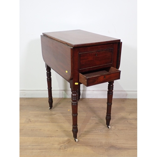 258 - A Victorian mahogany drop leaf Wash Stand fitted pair of cupboard doors mounted upon ring turned sup... 