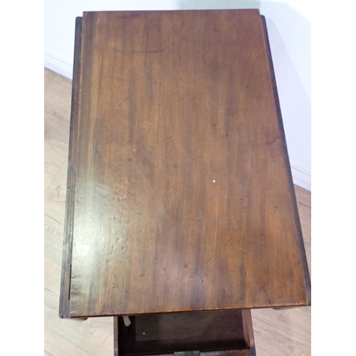 258 - A Victorian mahogany drop leaf Wash Stand fitted pair of cupboard doors mounted upon ring turned sup... 