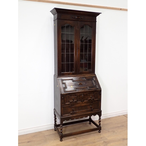 26 - A moulded oak and lead glazed Bureau Bookcase 6ft 10in H x 2ft 5in W