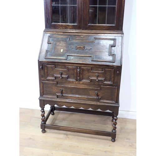 26 - A moulded oak and lead glazed Bureau Bookcase 6ft 10in H x 2ft 5in W