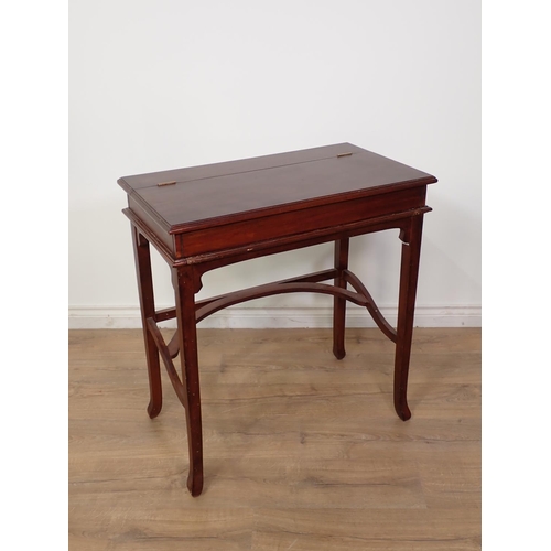 269 - An Edwardian mahogany Desk with lift up top 2ft 7in x 2ft 5in