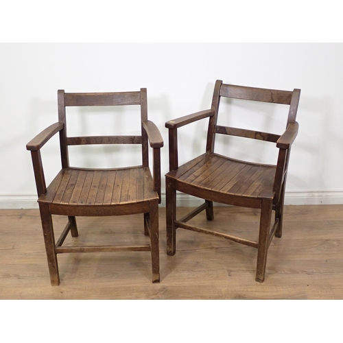 271 - A pair of oak Elbow Chairs