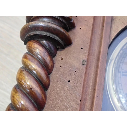 274 - A Victorian walnut Wall Clock and a gilt brass framed Wall Mirror