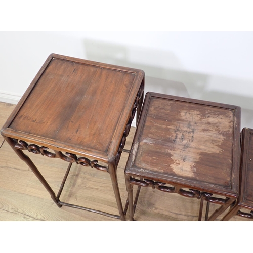 28 - A Chinese hardwood nest of four Occasional Tables 2ft 5in H x 1ft 3in W