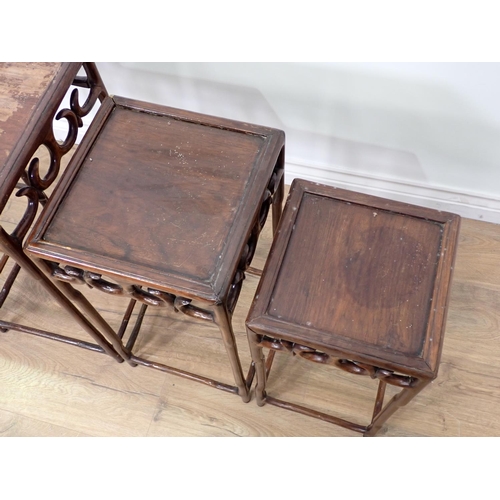 28 - A Chinese hardwood nest of four Occasional Tables 2ft 5in H x 1ft 3in W