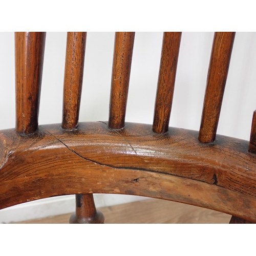 282 - An antique ash and elm pierced splat back Rocking Chair 3ft 5in x 2ft 1in