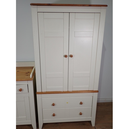 287 - A cream painted Press Cupboard, a matching Dresser and a beechwood High Chair