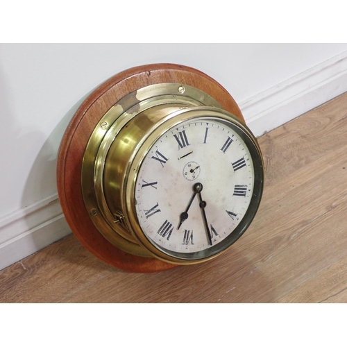 289 - An antique brass Ship's Clock 9in D