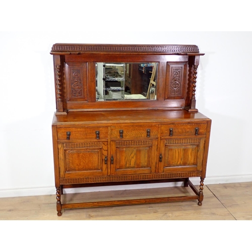 304 - A 20th Century oak mirror back Sideboard fitted three frieze drawers above three cupboard doors 5ft ... 