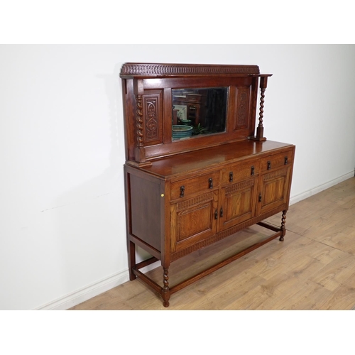 304 - A 20th Century oak mirror back Sideboard fitted three frieze drawers above three cupboard doors 5ft ... 