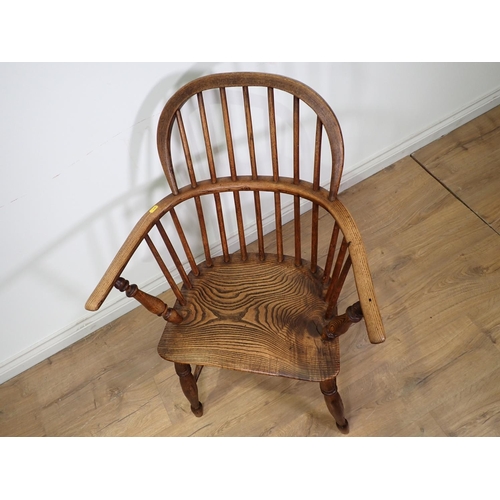 305A - A 19th Century ash and elm Windsor Elbow Chair on turned supports 2ft 11in x 2ft 1in