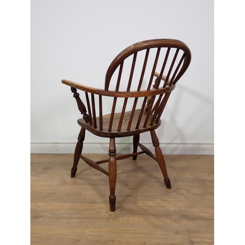 305A - A 19th Century ash and elm Windsor Elbow Chair on turned supports 2ft 11in x 2ft 1in