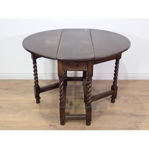 306 - An antique oak Gateleg Table fitted single end drawer on barley twist supports 3ft x 2ft 5in