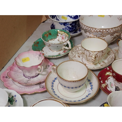 335 - A quantity of Tea Wares including gilt leafage service and Cups and Saucers