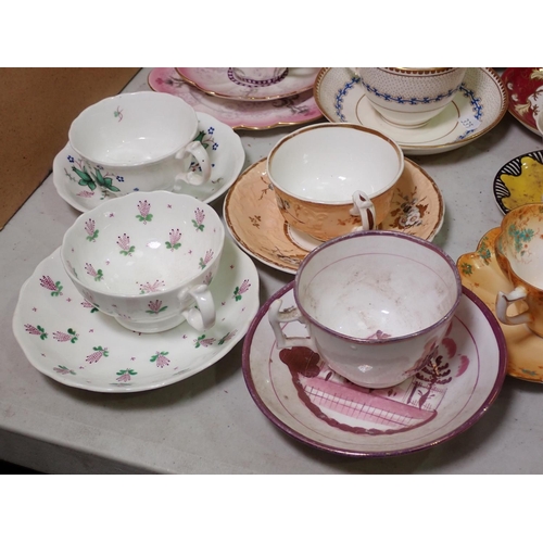 335 - A quantity of Tea Wares including gilt leafage service and Cups and Saucers