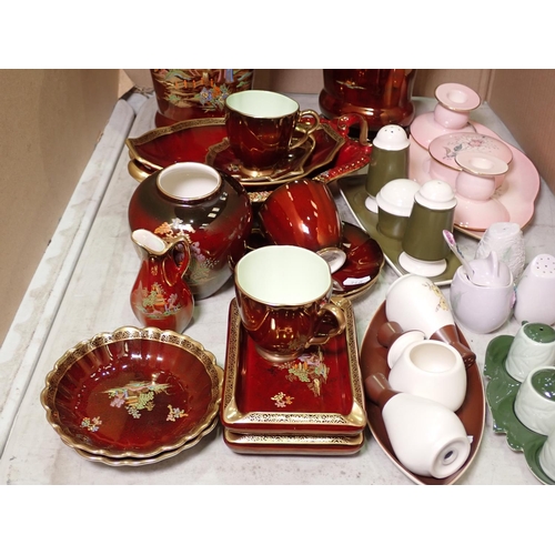 346 - A Crown Devon brown lustre Service, pink ceramic Dressing Table Set and Condiment Services