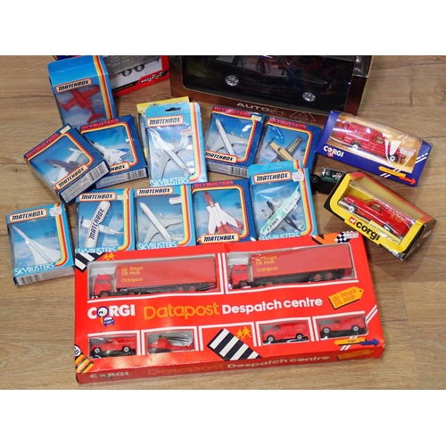 394 - A box of boxed Matchbox, Britains, Autoart and other diecast model vehicles