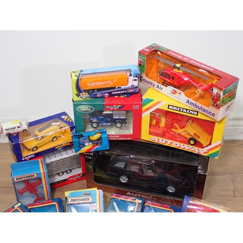 394 - A box of boxed Matchbox, Britains, Autoart and other diecast model vehicles