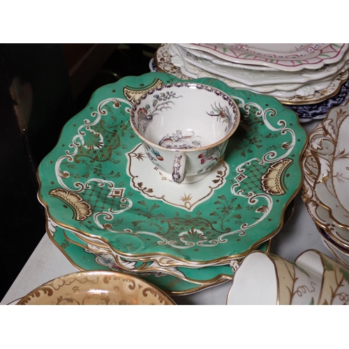 398 - A quantity of Tea Cups and Saucers, Side Plates, Jugs, blue glass Vase, etc.