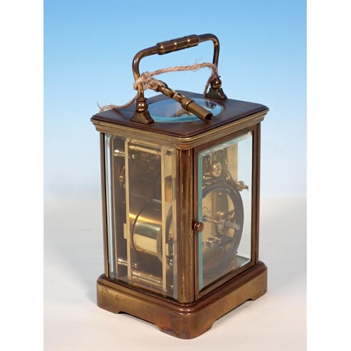 463 - A large brass Carriage Clock with white enamel dial, 5 1/4in H